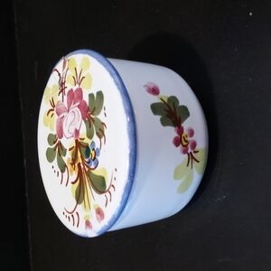 A small hand painted trinket box